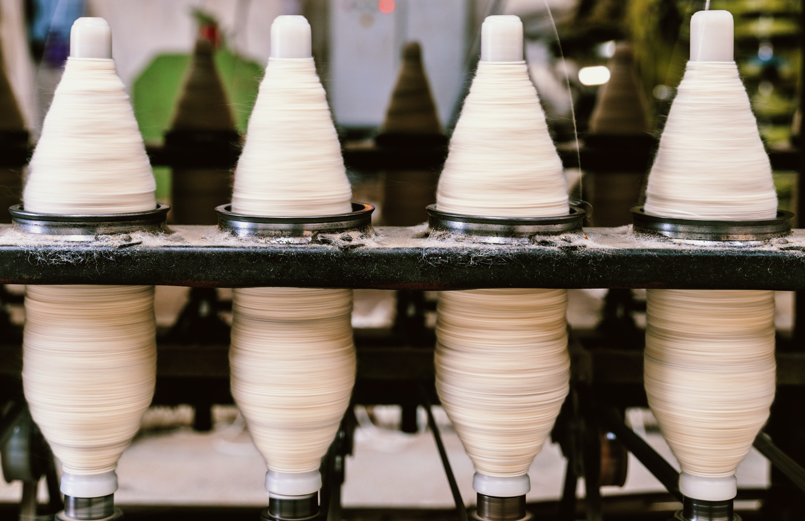 Buy Carpet in Delhi – Premium wool yarn spools prepared for handcrafted carpet and luxury rug manufacturing