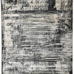 Abstract black and white rug featuring a distressed texture with layered rectangular patterns, creating a vintage and modern fusion aesthetic.