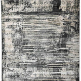 Abstract black and white rug featuring a distressed texture with layered rectangular patterns, creating a vintage and modern fusion aesthetic.