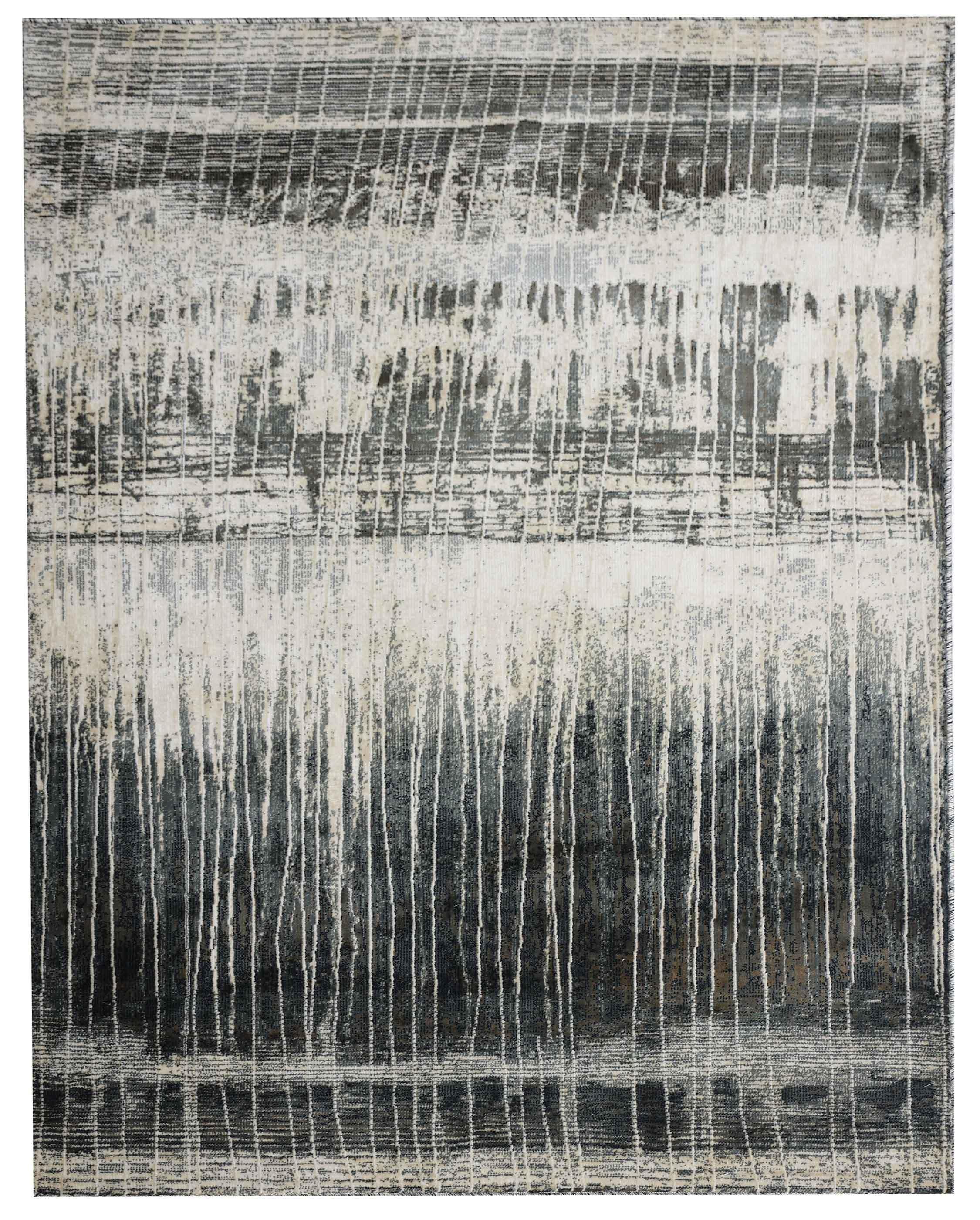 Abstract modern rug featuring vertical streaks of white and gray on a textured dark blue and black background, creating a calming, artistic feel.