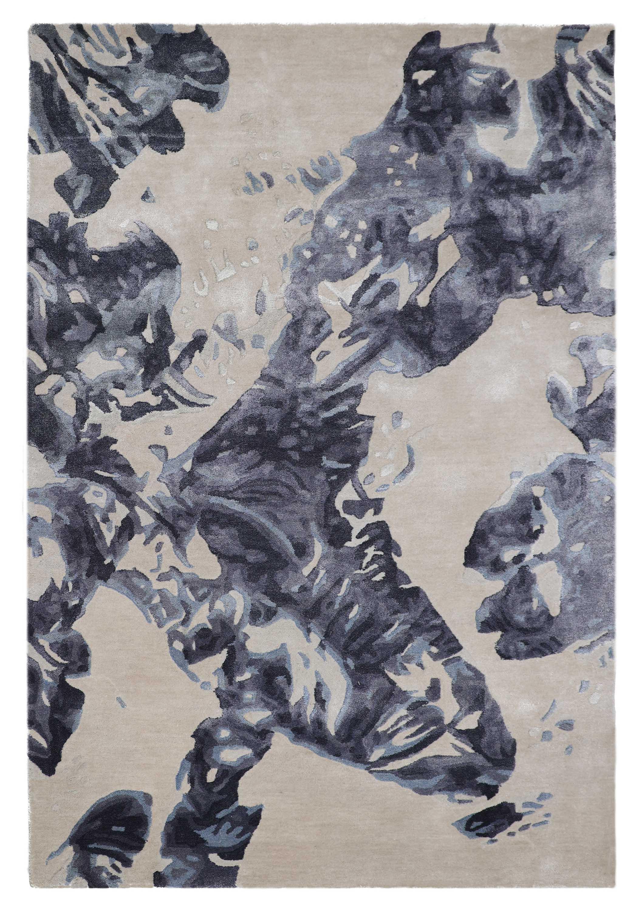 Luxury abstract rug with navy blue floral patterns on beige background, handcrafted for elegance.