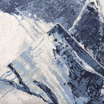 Blue and cream abstract patterned luxury rug with textured weave detail