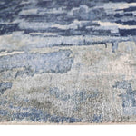 Blue and gray abstract patterned luxury rug with soft texture and modern design