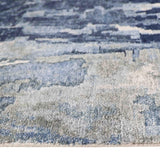 Blue and gray abstract patterned luxury rug with soft texture and modern design