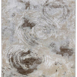 Abstract carpet design featuring swirling patterns in neutral tones of beige, brown, and white. Conveys a calming, textured, and artistic feel.