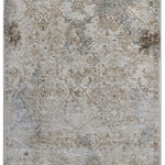 A vintage-style area rug with intricate floral patterns in muted earth tones, featuring subtle blue and brown accents, conveying a rustic, elegant feel.