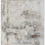 Abstract beige area rug with an aged texture. Features a mix of beige, white, and gray tones with irregular patterns, creating a rustic, vintage feel.