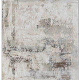 Abstract beige area rug with an aged texture. Features a mix of beige, white, and gray tones with irregular patterns, creating a rustic, vintage feel.