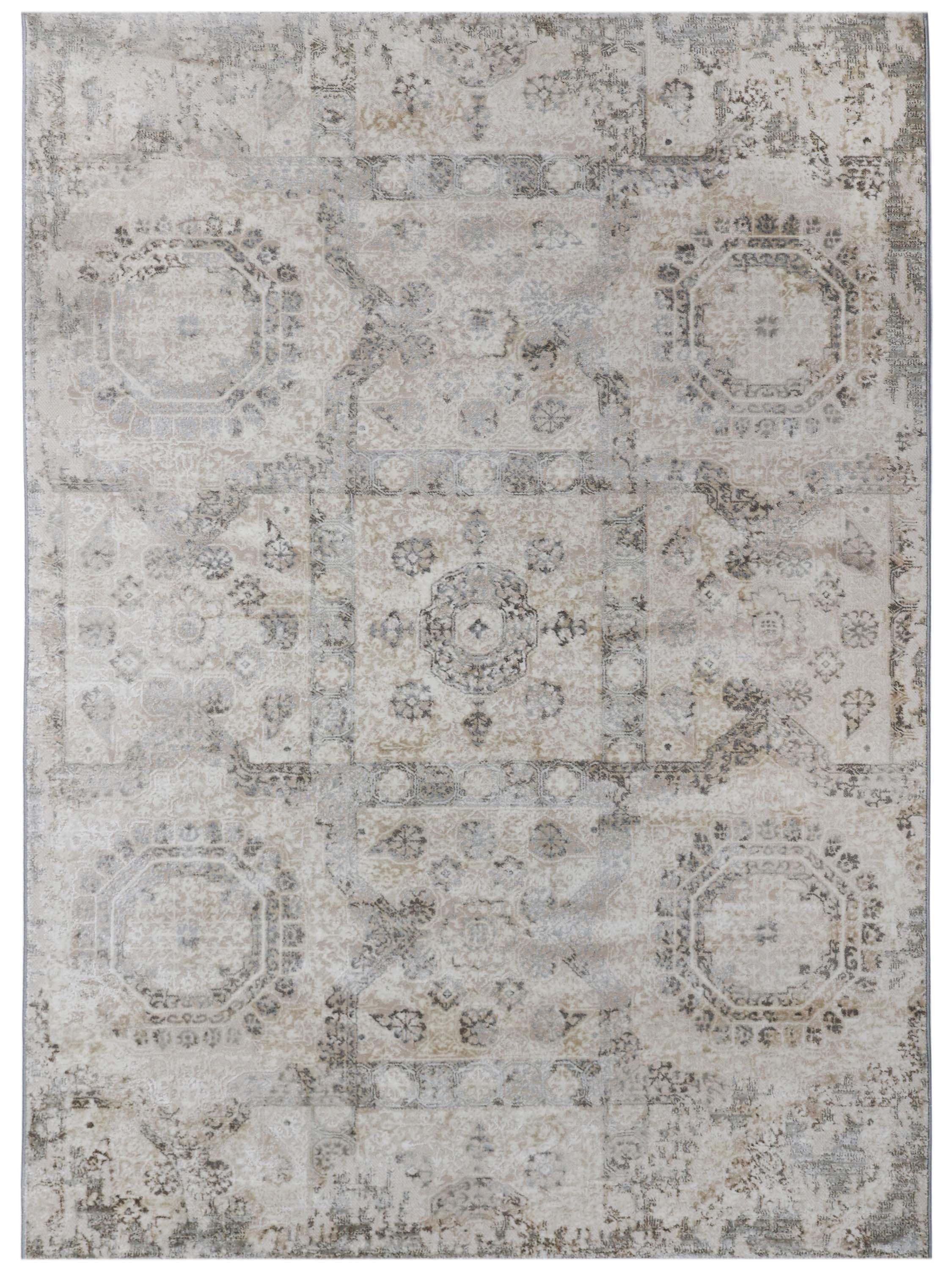 Faded beige rug with intricate, symmetrical patterns of octagons and circular motifs, conveying a vintage and elegant aesthetic.