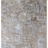 Abstract rug with a textured pattern in beige, gray, and rust tones, creating a distressed, modern look. The design is chaotic yet balanced.