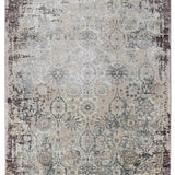 Vintage-style rug featuring a faded floral and geometric pattern in muted tones of beige, gray, and hints of brown, creating an antique, elegant look.