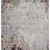 Abstract rug with an intricate, distressed design. Features muted tones of beige, gold, and hints of pink and gray, creating an elegant vintage look.