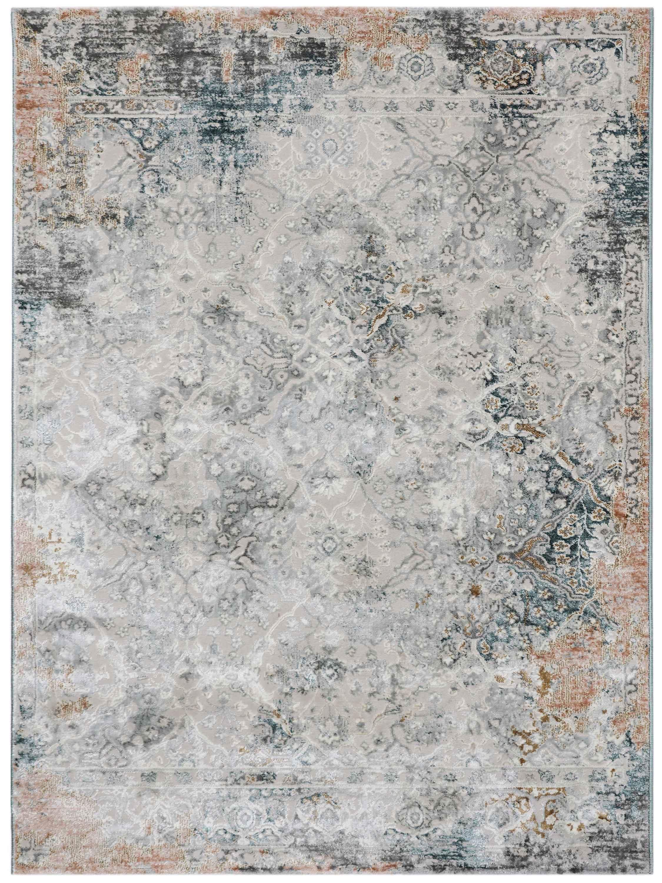 A distressed, ornate area rug featuring an abstract pattern in muted hues of gray, blue, and beige, with hints of rust along the edges and a vintage look.