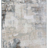 Abstract rug with a textured, distressed pattern in gray, beige, and blue tones. The design has a weathered look, conveying a subtle, vintage feel.