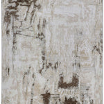 Abstract design rug in beige and brown tones, featuring a distressed texture. The pattern resembles brushstrokes, evoking an earthy, rustic feel.