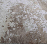 Luxury beige and white patterned rug with textured abstract design, ideal for elegant home decor.