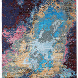 Abstract luxury rug with vibrant blue, pink, and gold distressed pattern for modern home decor