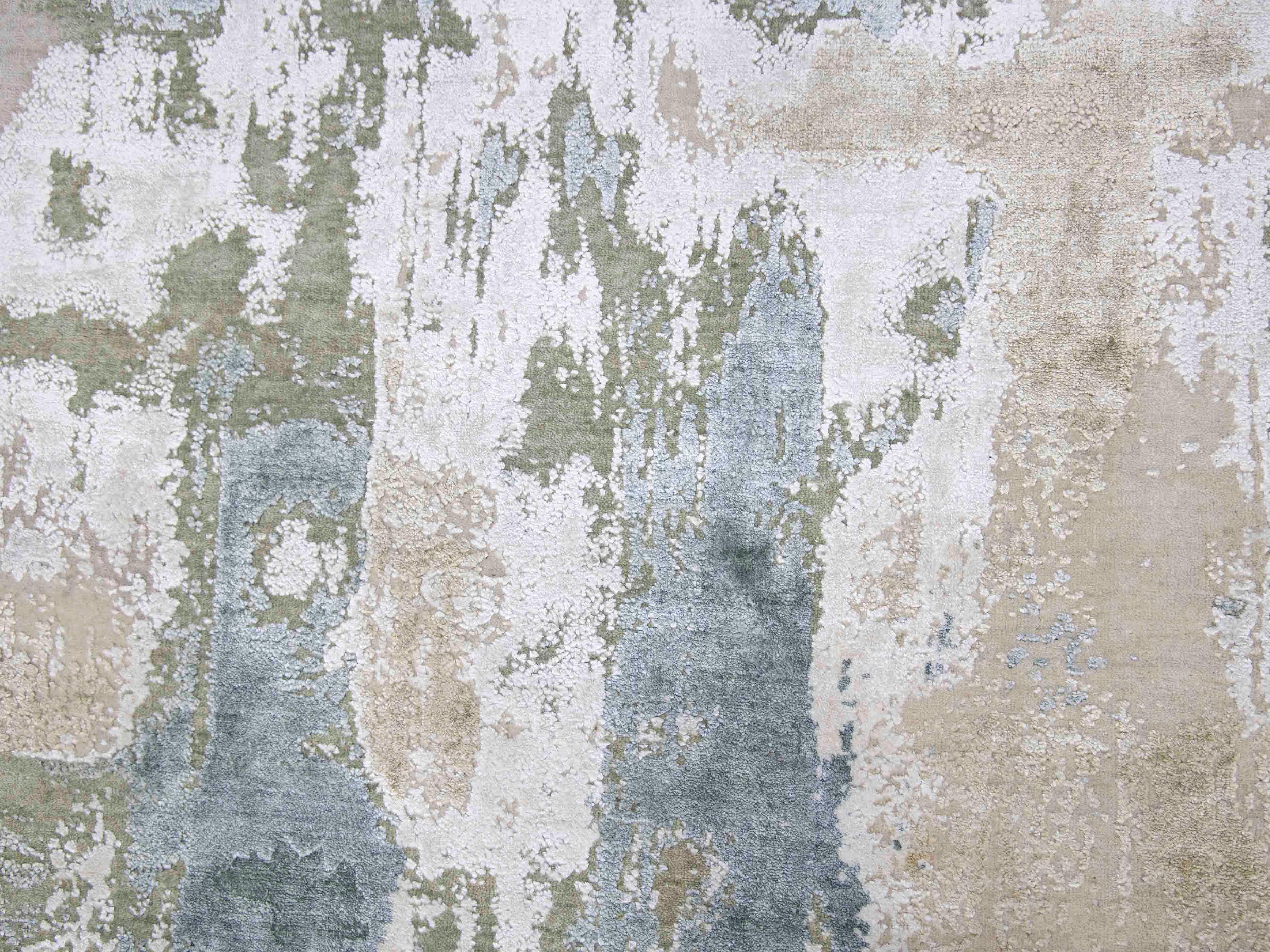 Abstract luxury rug with soft green, blue, and beige tones for elegant home decor