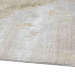 Soft beige luxury rug with subtle abstract patterns and plush texture for elegant home decor